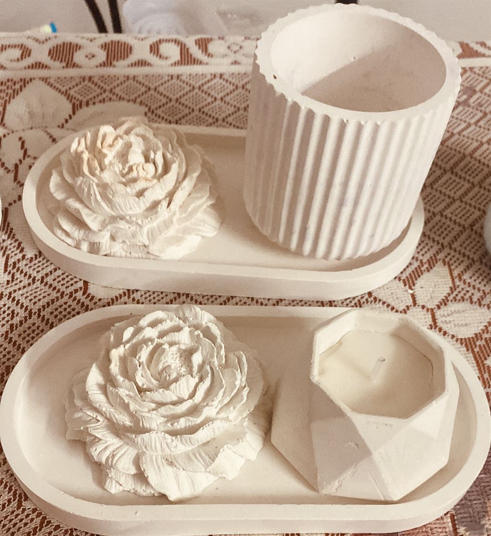 White peony candle on a stone tray