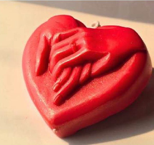 Hand in Heart Candle