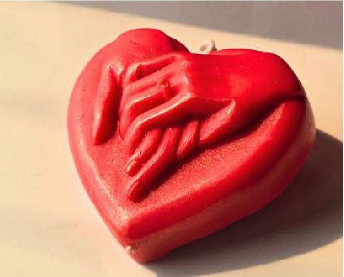 Hand in Heart Candle